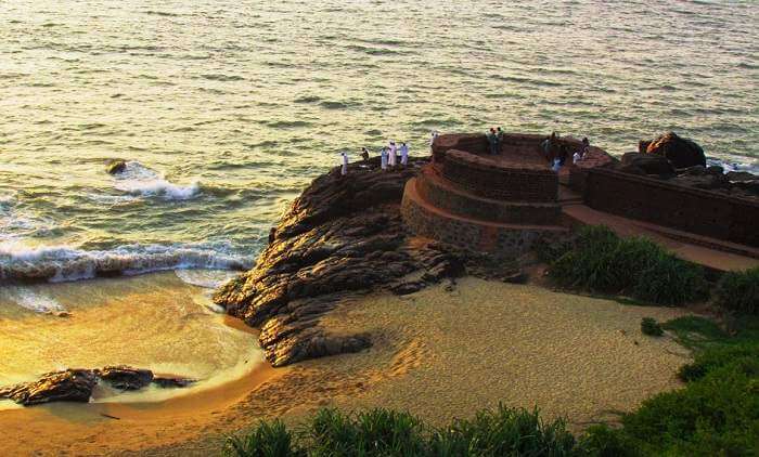 The stunning Bekal Fort with the background of colorful sunset at Bekal in Kerala