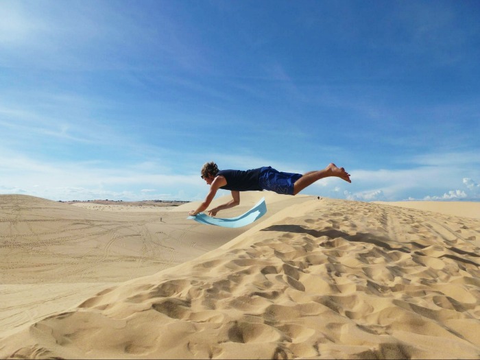 Sand boarding - one of the things to do in Southeast Asia