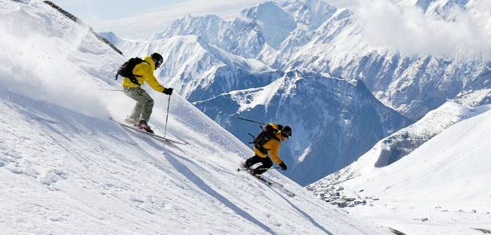 Skiing in Auli's snow filled hill station, an adventure destination