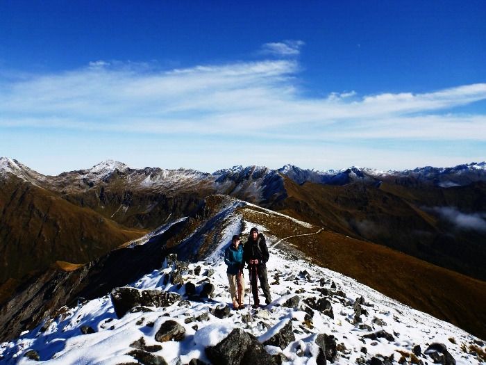 A Couple trekking in their honeymoon in Switzerland