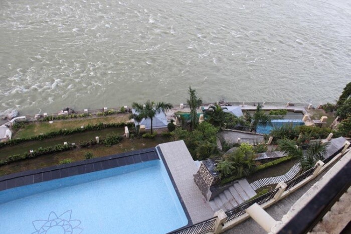 An aerial shot of the swimming pool at the Divine Resort In Rishikesh