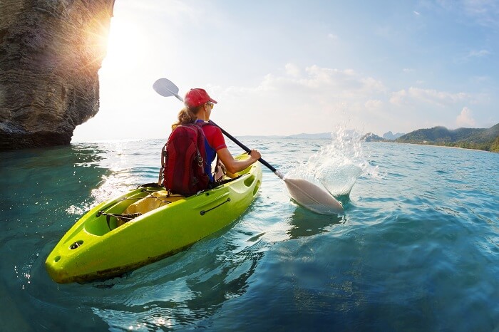 A woman tries sea kayaking in Koh Samui