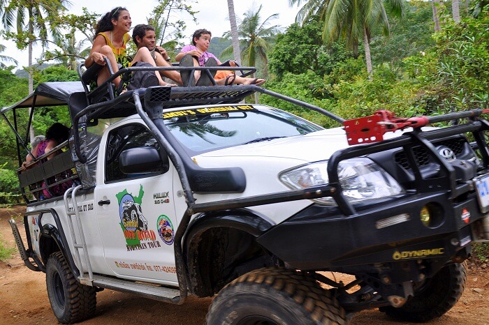 Tourists take a jeep safari in Koh Samui