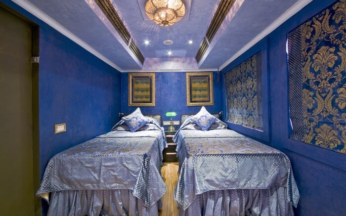 Royal interiors of one of the cabins of Royal Rajasthan on Wheels