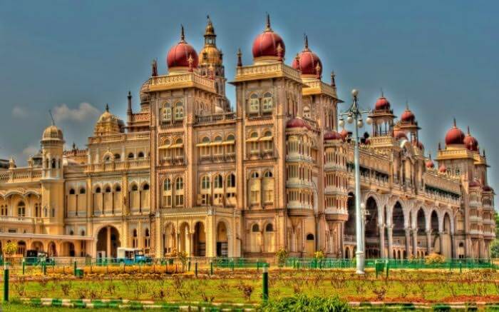 The courtyards and gardens surrounding the Mysore Palace