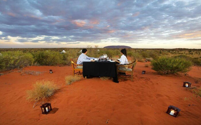 A couple dining in Longitude 131°