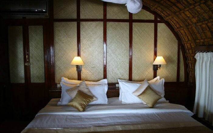 A well laid-out bedroom of Spice Coast Cruises in Alleppey 