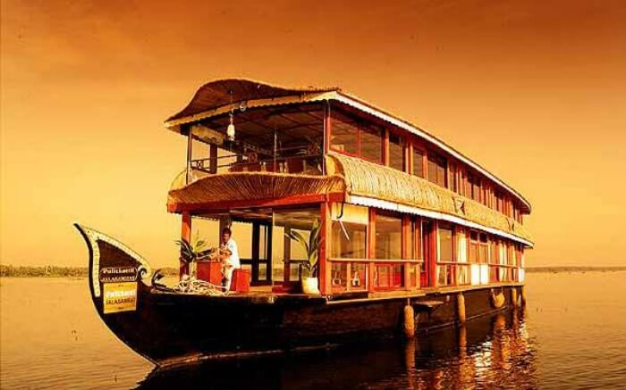 Front view of Pulickattil Houseboat on a bright day in Alleppey 
