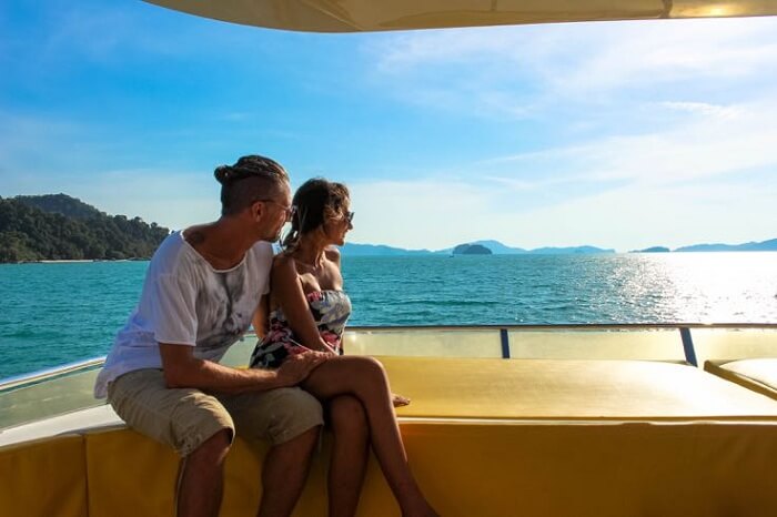 A couple taking a cruise ride in Malaysia