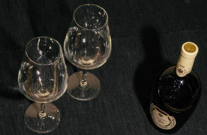 two glasses and bottle of red wine
