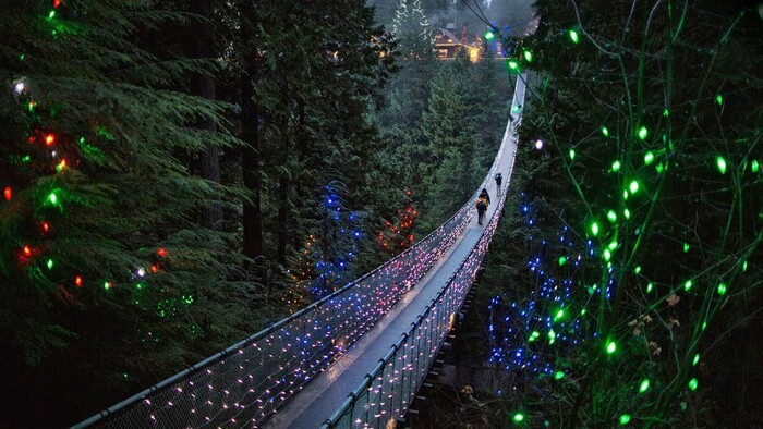 Glittering night view of walkway to Capilano Suspension Bridge in Vancouver