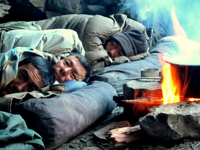 Trekkers enjoying a warm sleep in one of the caves enroute Zanskar