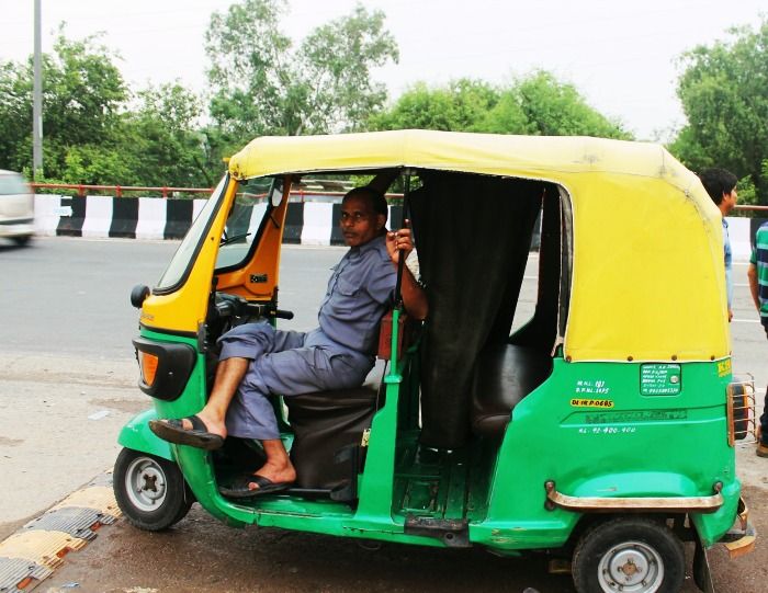 An autowala waiting for his safari