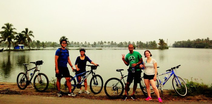 Cyclists stop by to click themselves over their cycling expedition from Kochi to backwaters
