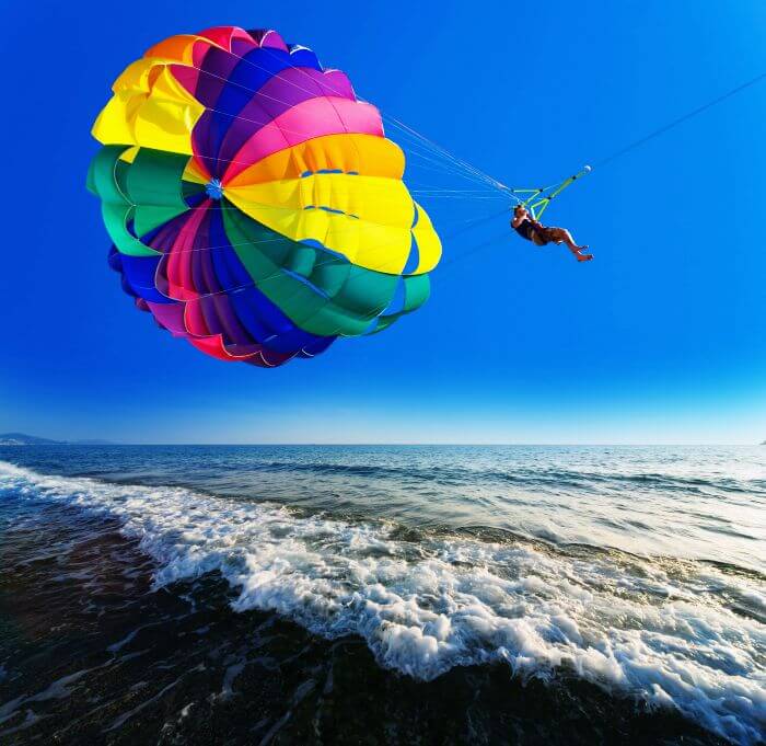 Let the speedboat pull you for a fantastic experience as try parasailing in Bali