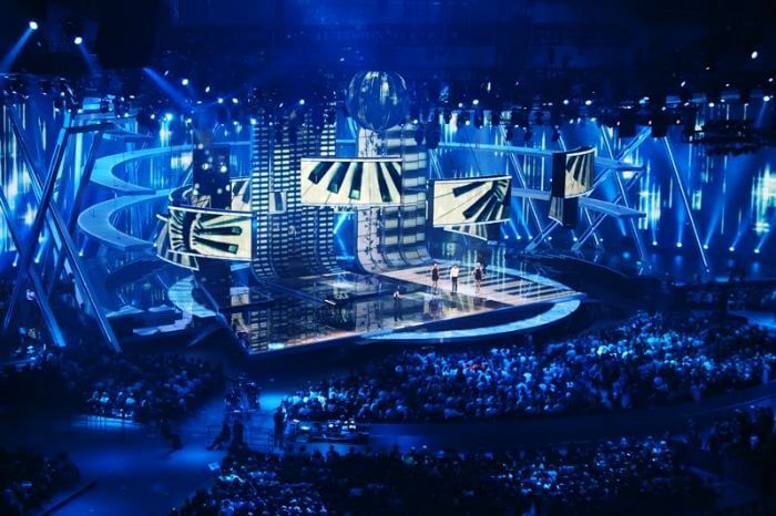 A grand event with a vast audience being conducted by an event management firm