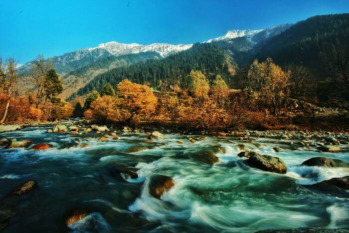 Water flows with rage in autumns in Kashmir