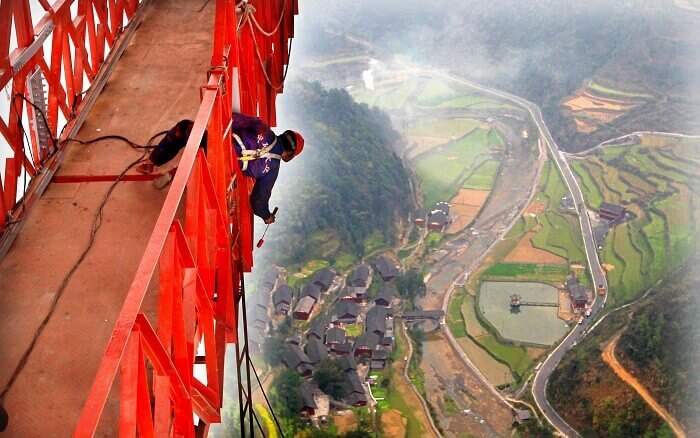 The view of the city below from the Aizhai suspension bridge in China