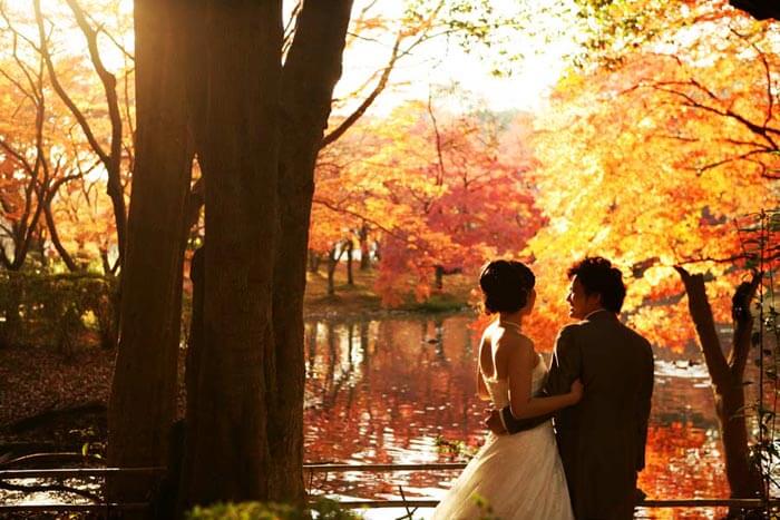 A couple near a lake in Kyoto, Japan