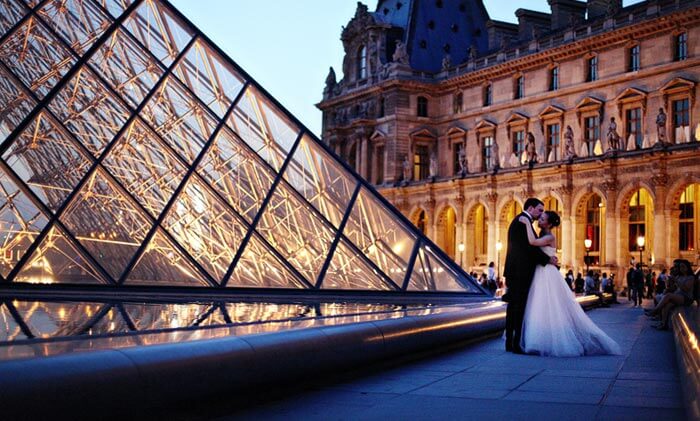 A couple at The Louvre Museum, Paris