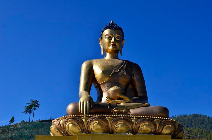 The gronze-gold Buddha Dordenma Statue is among the popular Bhutan tourist places