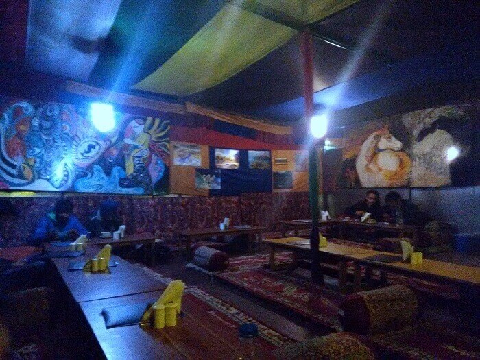 The dark interiors of a cafe in Kasol