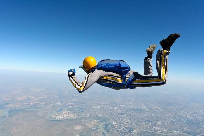 A person practicing free falling from an aircraft