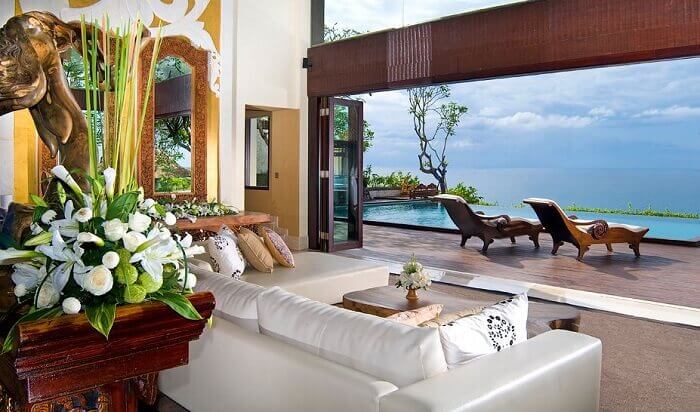 The view of the living room overlooking the blue waters of Indian Ocean at Ayana Resort villas