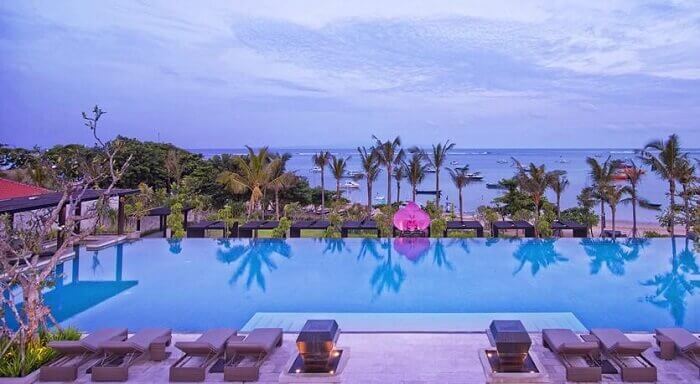 The 50 m long infinity pool adds at the Fairmont beach resort in Bali