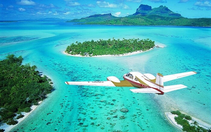 The Air Tahiti flight over the blue waters of Polynesia