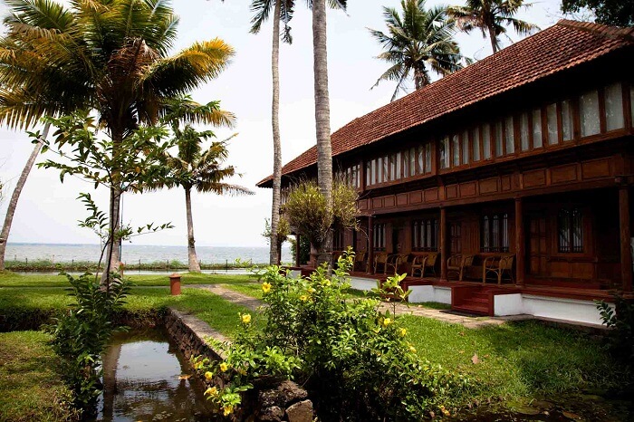 A view of the Coconut Lagoon resort and the lake in backdrop