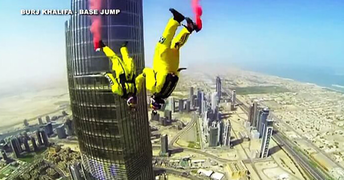 Skydivers base jumping from Burj Khalifa