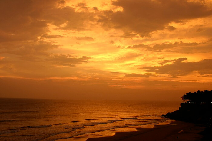 A beautiful view of the setting sun at Varkala Beach