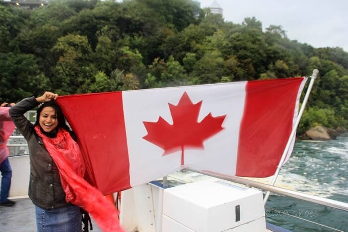 Leena waving the flag of Canada