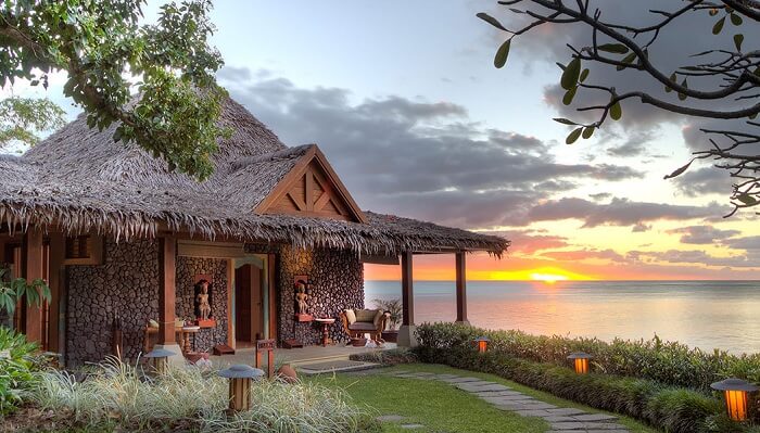 A sunset snap of a hut at the Wakaya Resort