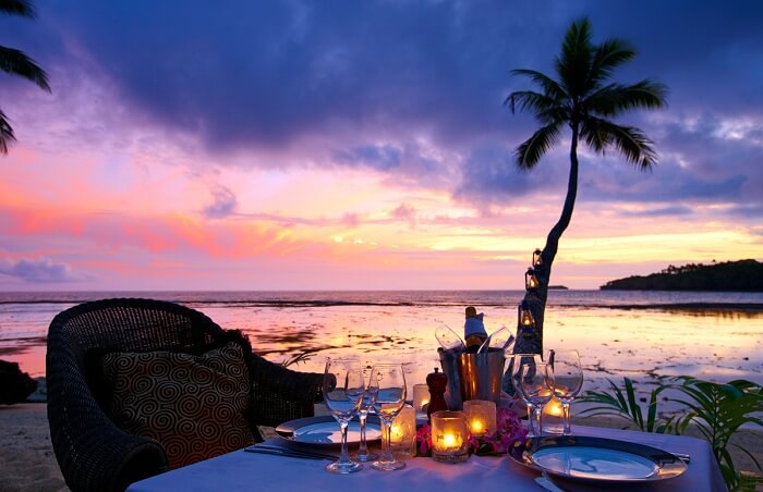 A beachfront dining at the Namale Resort in the backdrop of a beautiful sunset