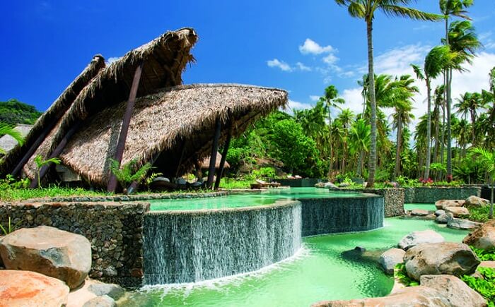 The turquoise waters of the swimming pool at the Laucala Island Resort