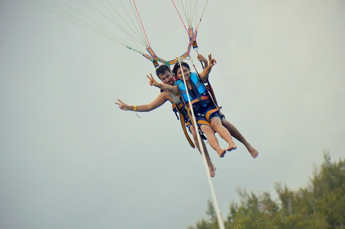 Manuj and his wife doing parasailing in Ile Aux Cerfs Mauritius