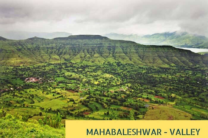 An aerial view of the green valley and tropical highlands at Mahabaleshwar during rains