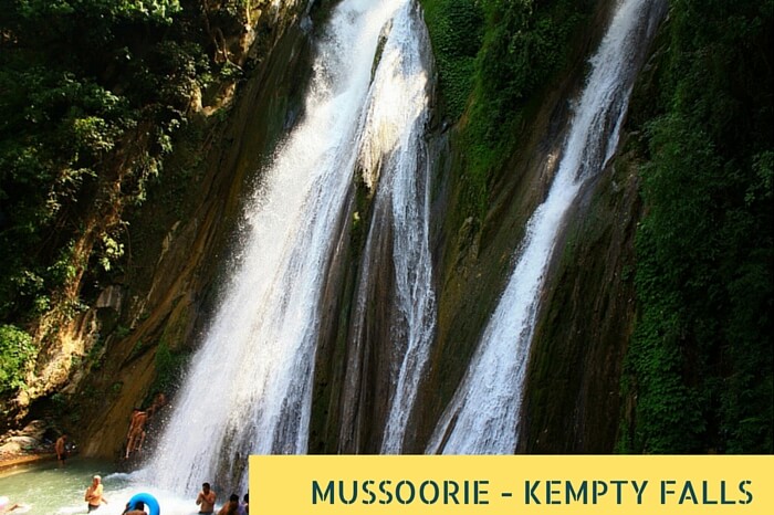 Tourists taking bath at the famous Kempty Waterfalls near Mussoorie during summer holidays in India