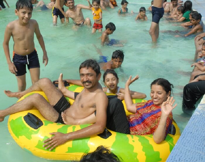 A family enjoys happy time at the Ajwa Fun World