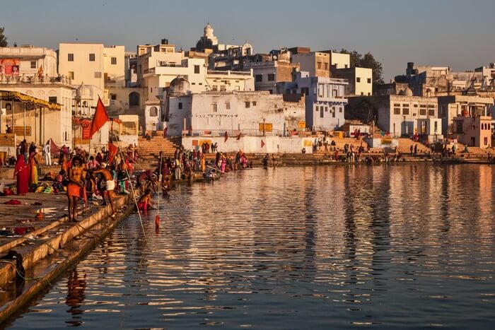 Pilgrims bathing at one of the ghats of Pushkar Lake