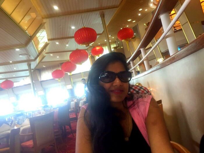 Kavya in the restaurant of the Star cruise