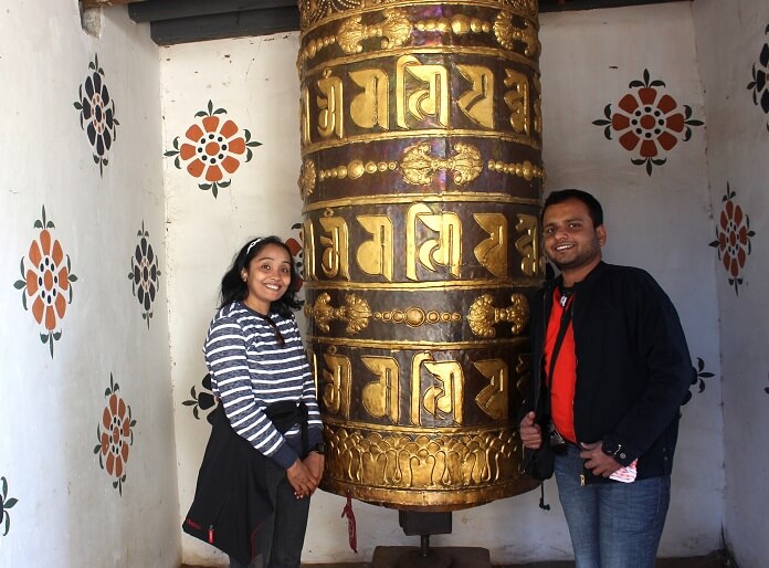 Alpana and her husband in a temple