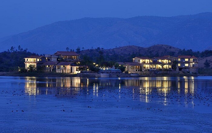 A distant shot of the Jhadol Safari Resort and the Jhadol Lake