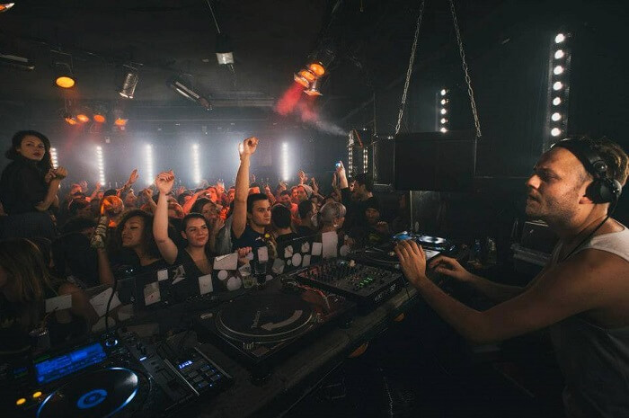 DJ making the crowd dance to his playlist