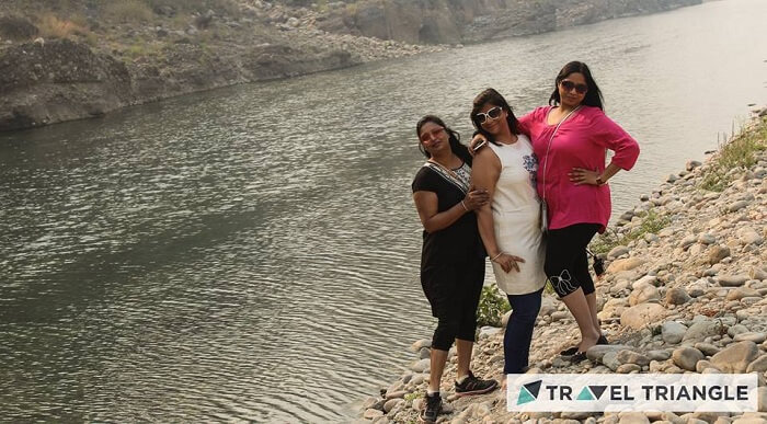 Girls on the banks of river in Jim Corbett