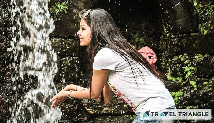 Girl near river in Jim Corbett