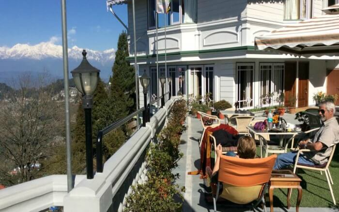 Guests relaxing and enjoying the Kanchenjunga Range view