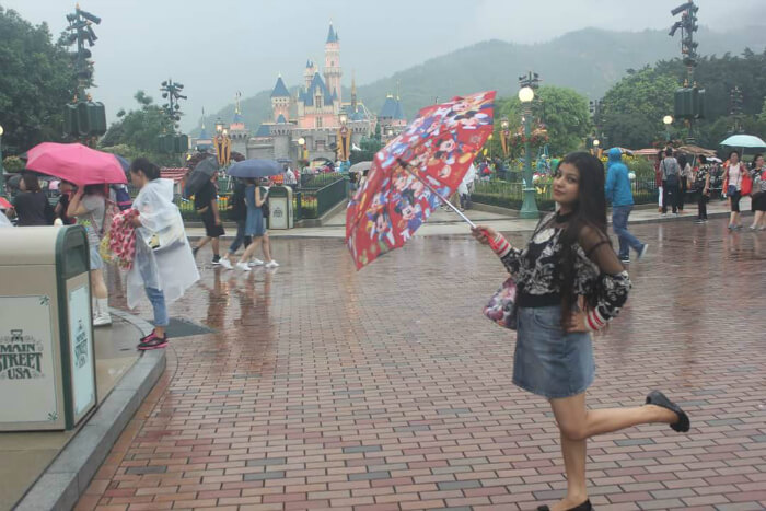 Mitul's wife in Disneyland in Hong Kong